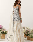 Ivory Strappy Short Kurti Paired With Gharara & Dupatta