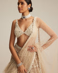 Light Beige Pearl Drop Multi Tier Lehenga Set.