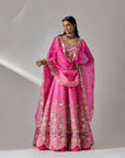 Fuschia Pink Lehenga And Blouse With An Organza Dupatta