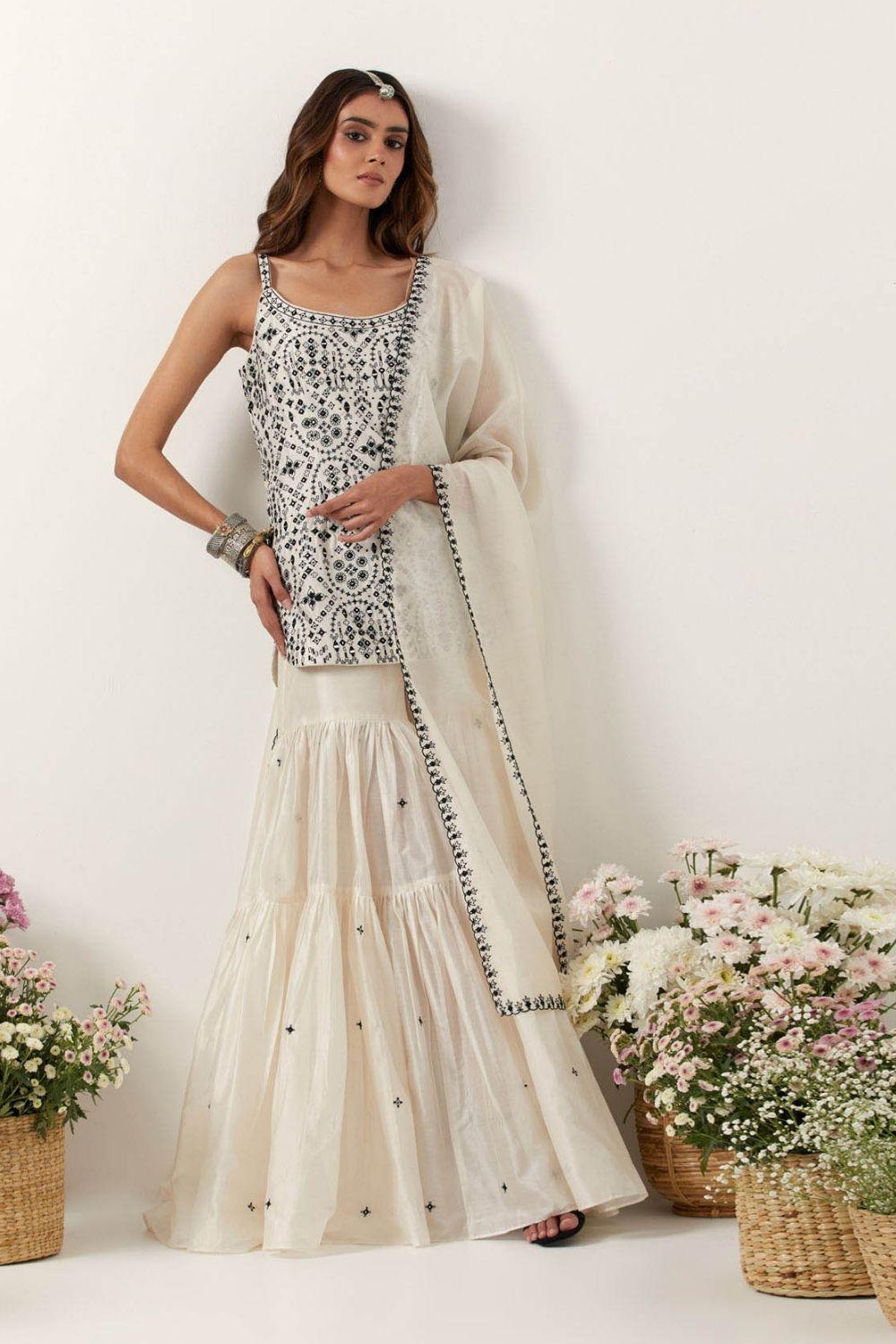 Ivory Strappy Short Kurti Paired With Gharara &amp; Dupatta