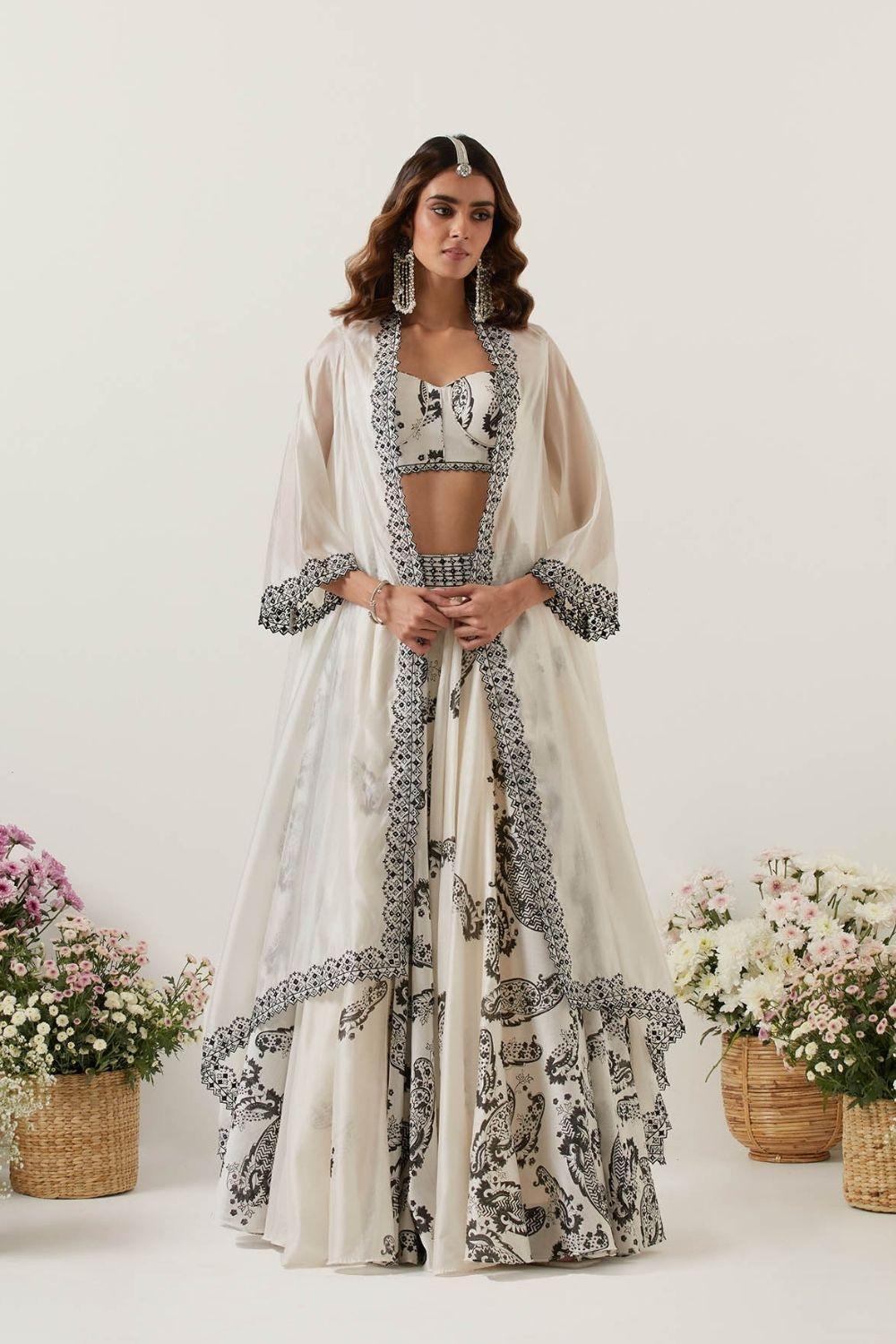 Ivory Printed Skirt Paired With Bralette &amp; Cape