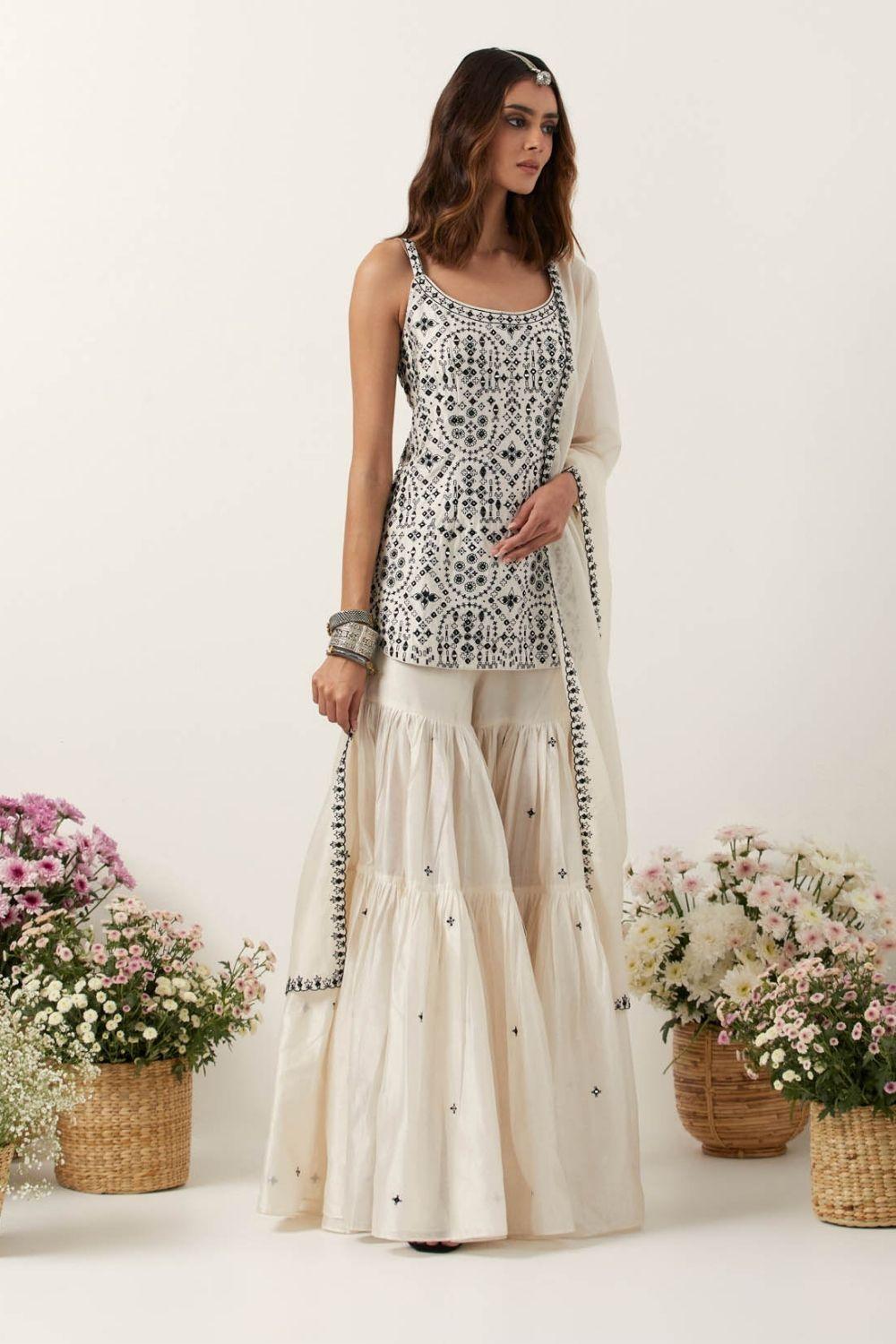 Ivory Strappy Short Kurti Paired With Gharara &amp; Dupatta