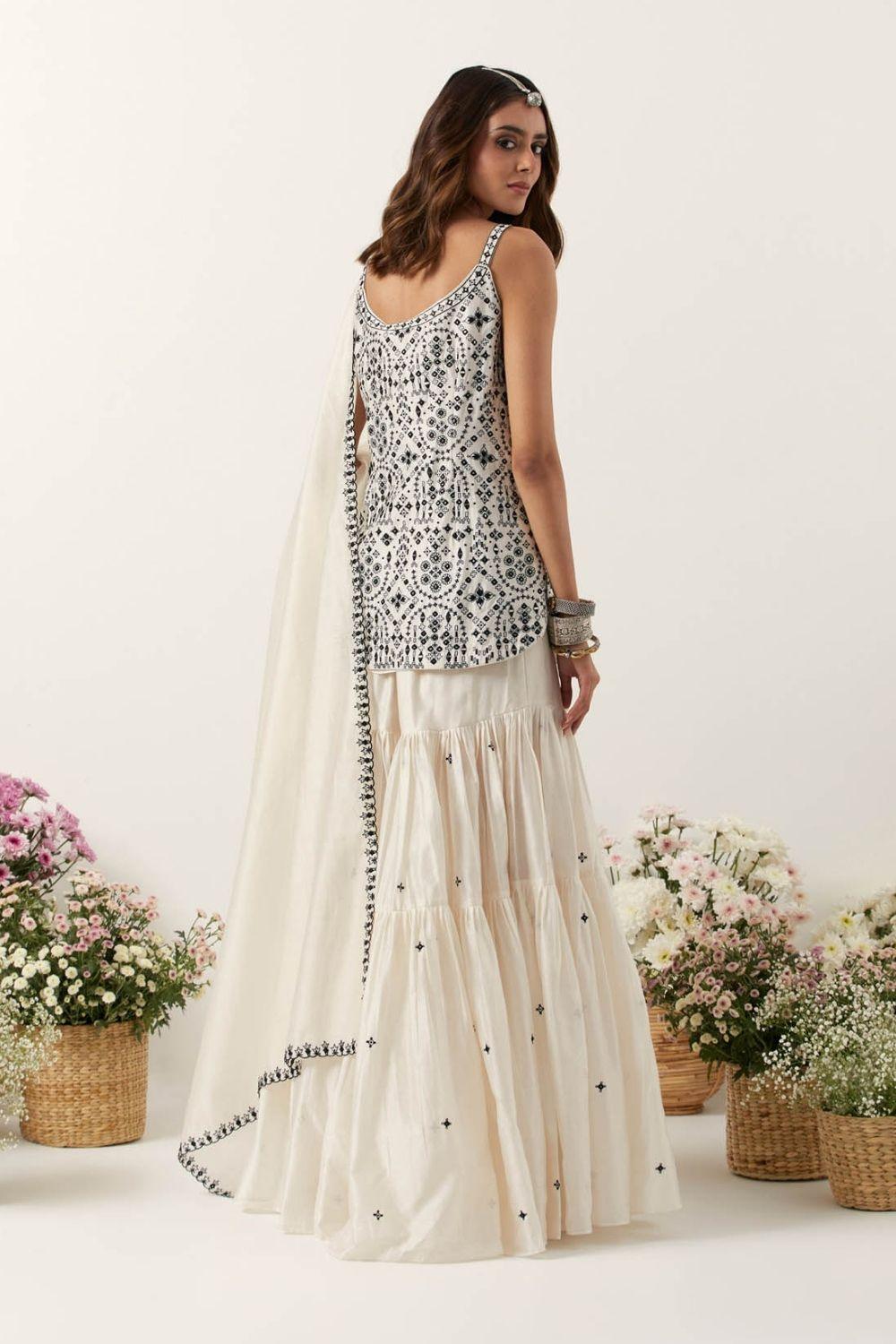 Ivory Strappy Short Kurti Paired With Gharara &amp; Dupatta