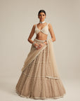 Light Beige Pearl Drop Multi Tier Lehenga Set.
