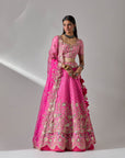 Fuschia Pink Lehenga And Blouse With An Organza Dupatta