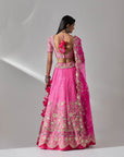 Fuschia Pink Lehenga And Blouse With An Organza Dupatta