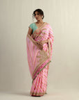 Powder Pink Moonga Silk Saree With A Sky Blue Blouse