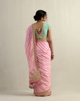 Powder Pink Moonga Silk Saree With A Sky Blue Blouse