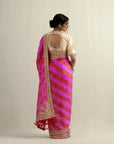 Fuschia Moonga Silk Saree With An Ecru Blouse
